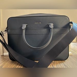 NWOT.  Michael Kors Harrison unisex briefcase.  Color is navy—closest to 1st pic